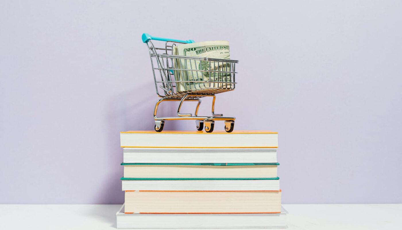 shopping cart on top of books